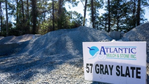 mound of 57 gray slate with sign on right